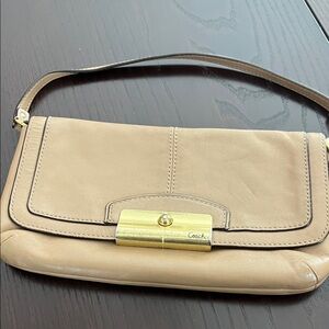 Very vintage Coach Tan Leather Clutch with Gold Accent